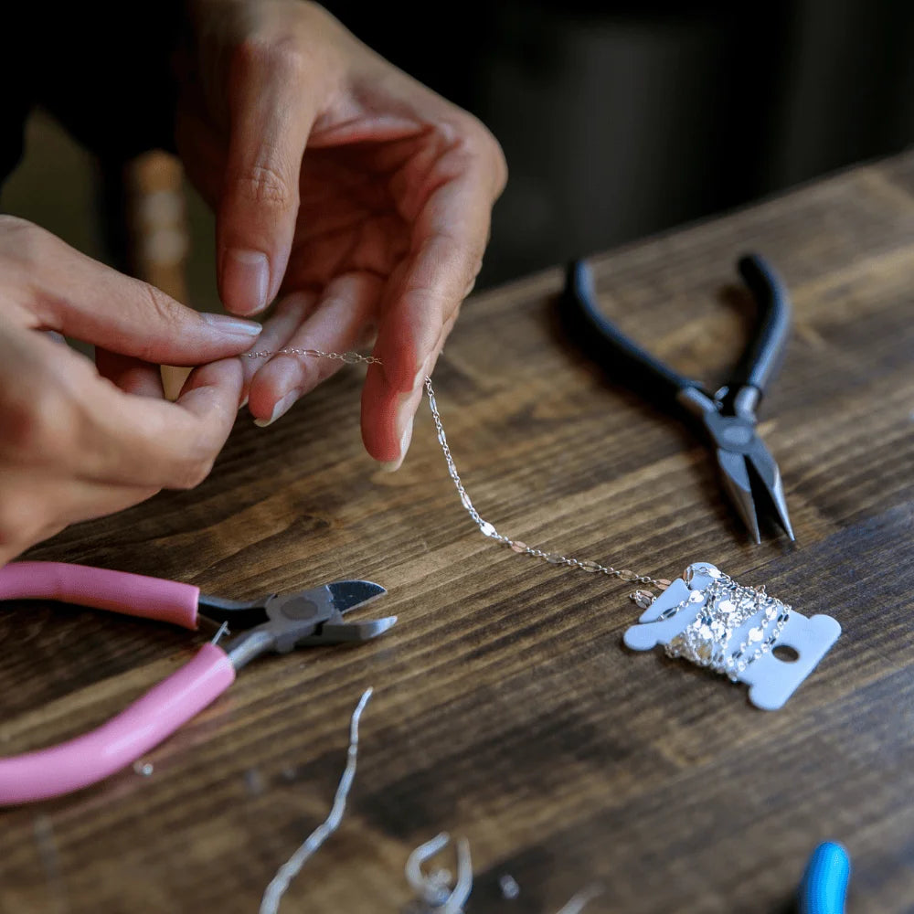 Person fixing jewellery