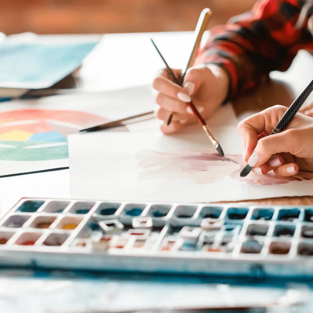 Child and Adult Painting with Watercolour